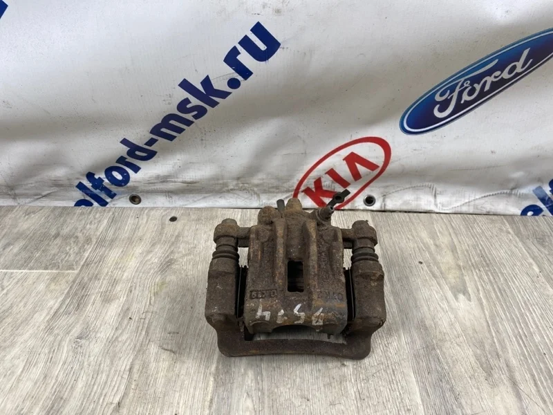 Суппорт тормозной KIA RIO 2010