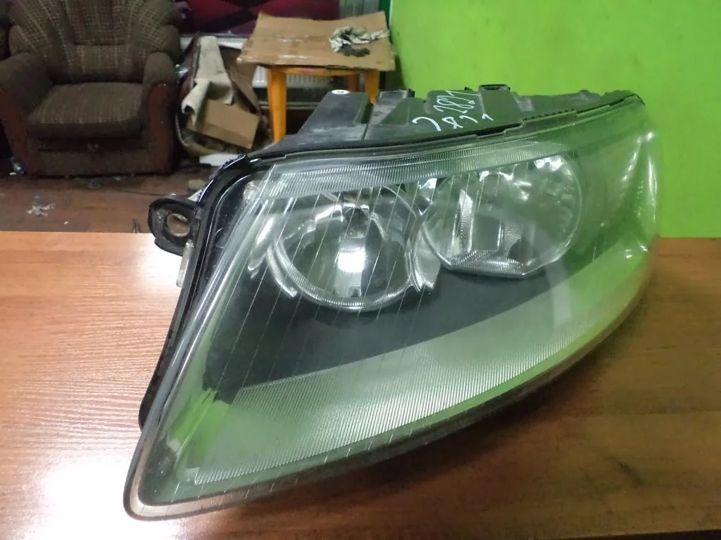 Фара левая Audi A6 C6 2005-2008 4F0941003A