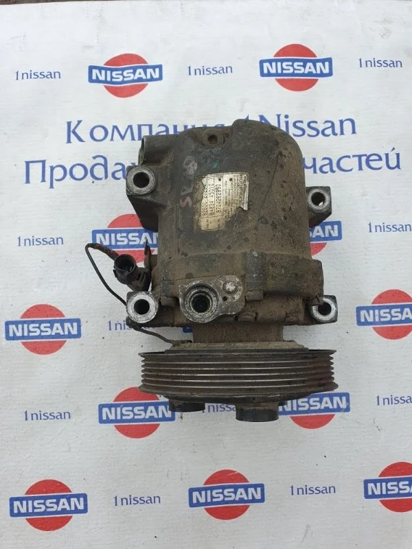 Компрессор кондиционера Nissan 926002J204, передний