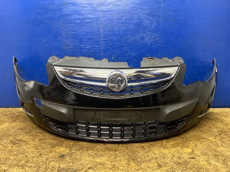 Бампер Opel Corsa D 2010-2014 13285996, передний