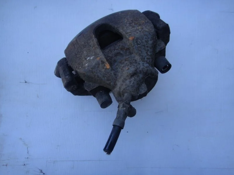 Суппорт тормозной FORD FOCUS 1 2004 СЕДАН