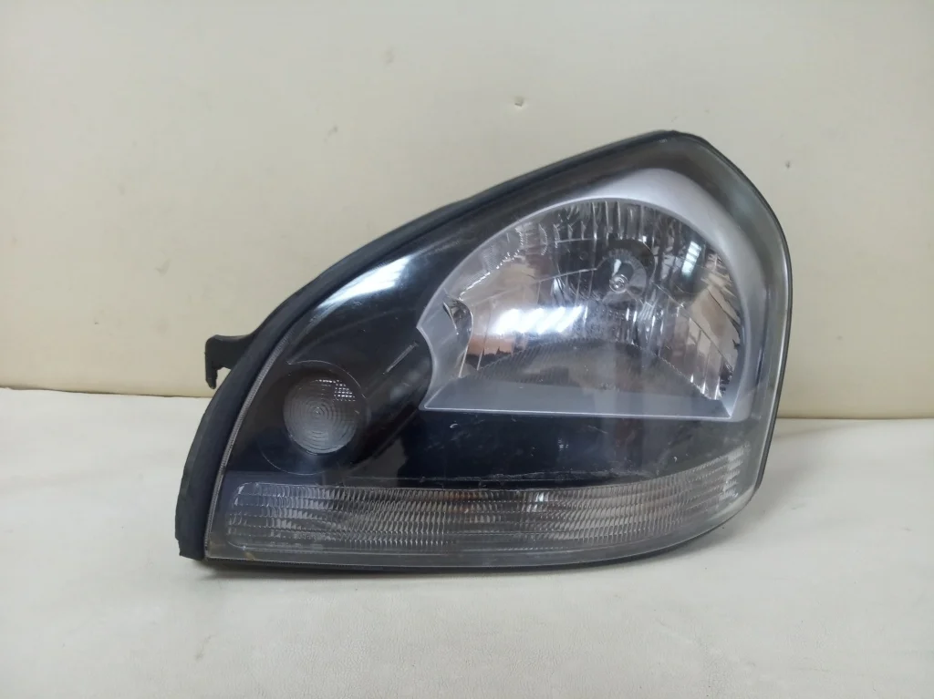 фара левая HYUNDAI TUCSON 1  JM    ХУНДАЙ   ТУКСОН   Левый  921012E000 2004-2015 (контрактная запчасть)