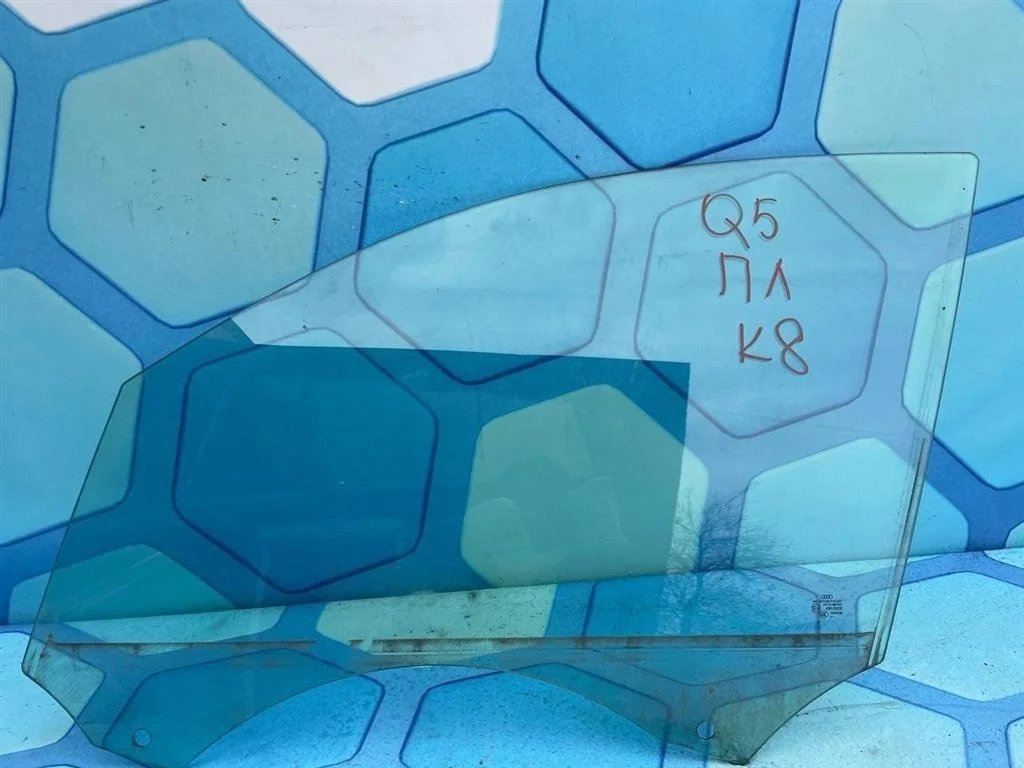 Стекло двери передней левой