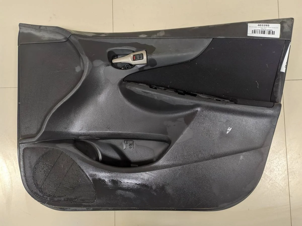 Обшивка двери передней правой Toyota Corolla E150 2006-2013