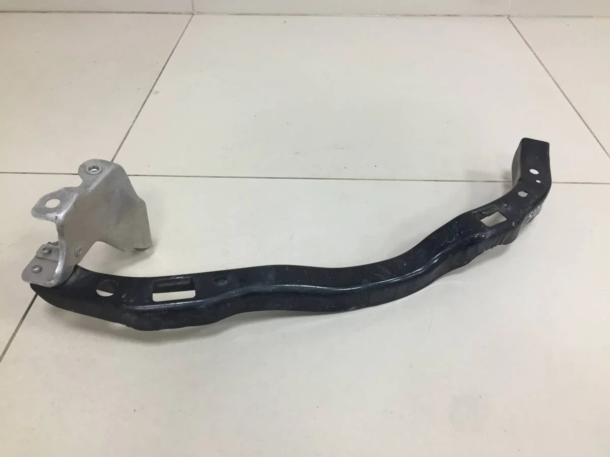 Кронштейн фар левый Subaru Legacy B13 2003-2009