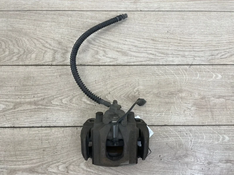 Суппорт тормозной VW Touareg 2003-2010 7L
