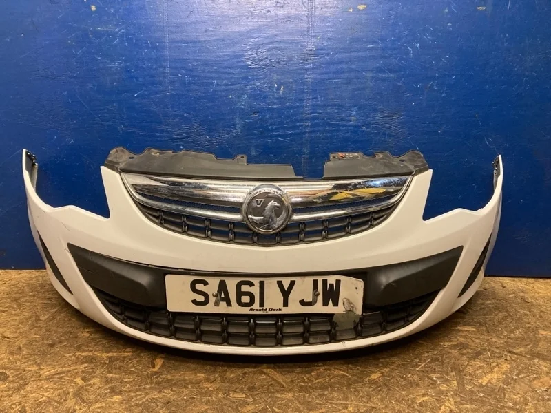 Бампер Opel Corsa D 2010-2014 13285996, передний