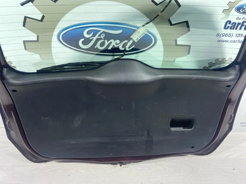 Обшивка двери багажника Ford Fusion (01-12) UAV