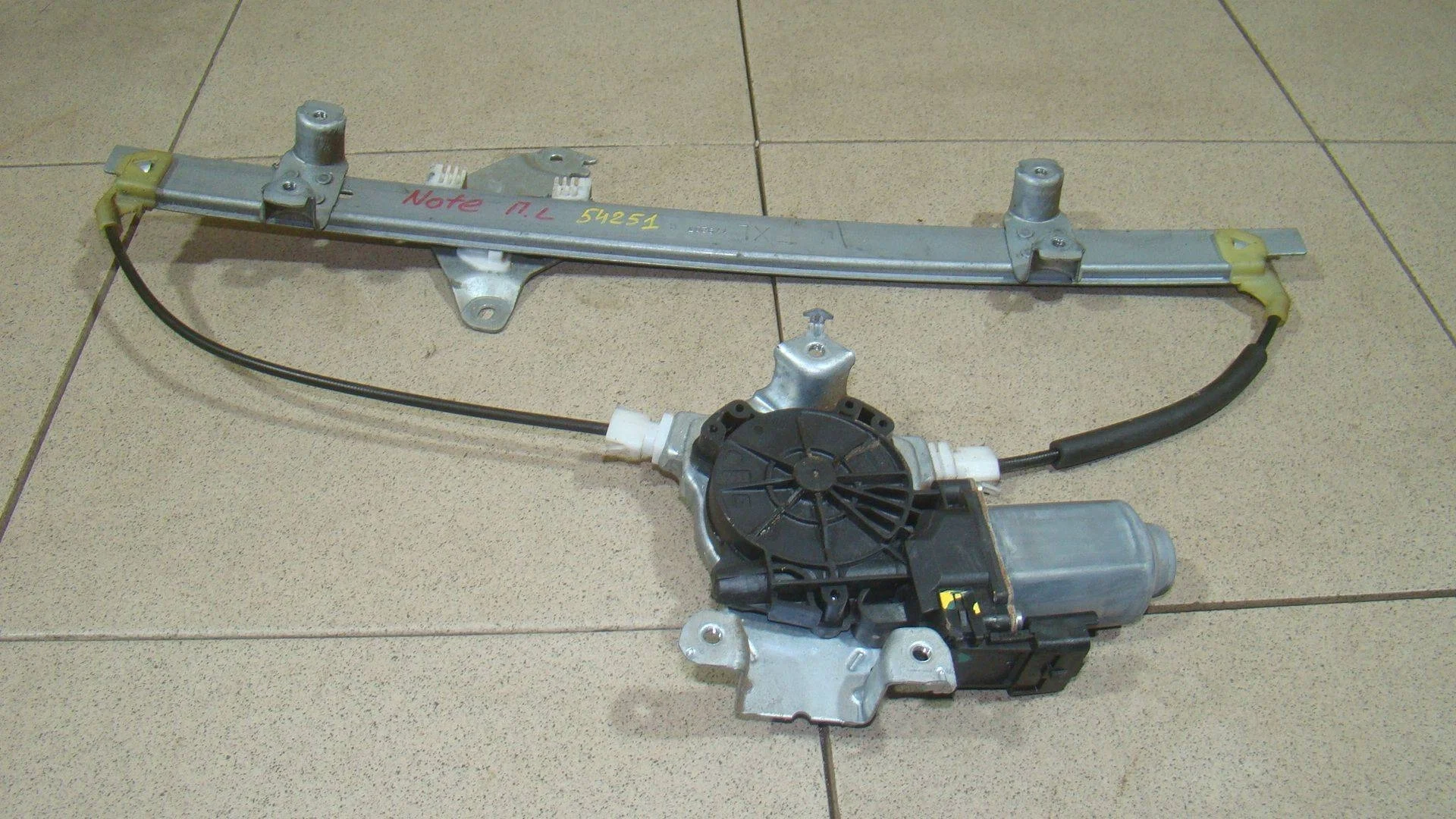 Стеклоподъемник электр. передний левый Nissan Note (E11) 2004-2013