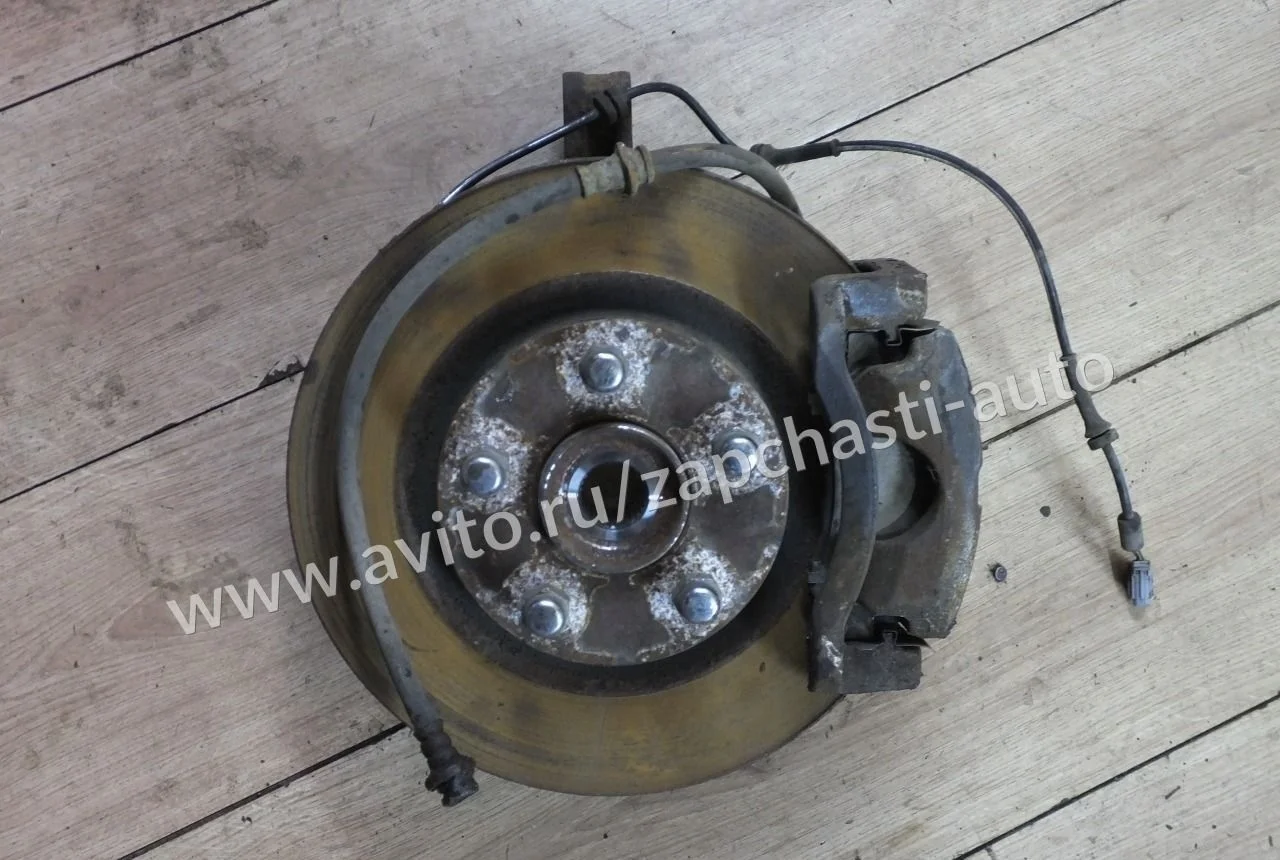 Кулак поворотный правый Nissan Qashqai J10