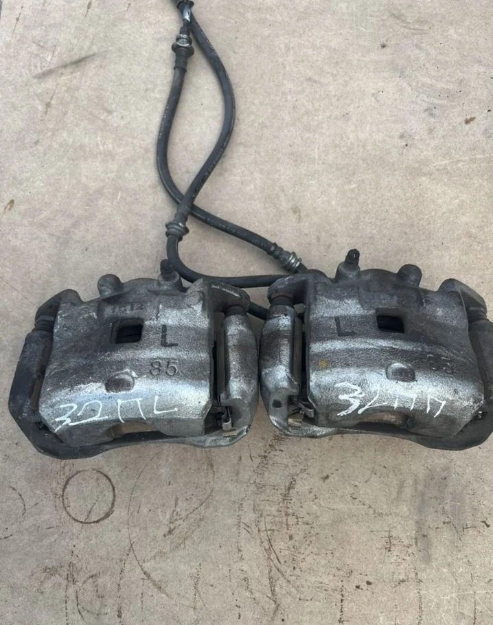 Суппорт передний Nissan Tiana J32