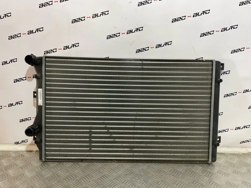 Радиатор охлаждения двигателя Volkswagen Passat 1K0121253BB B7