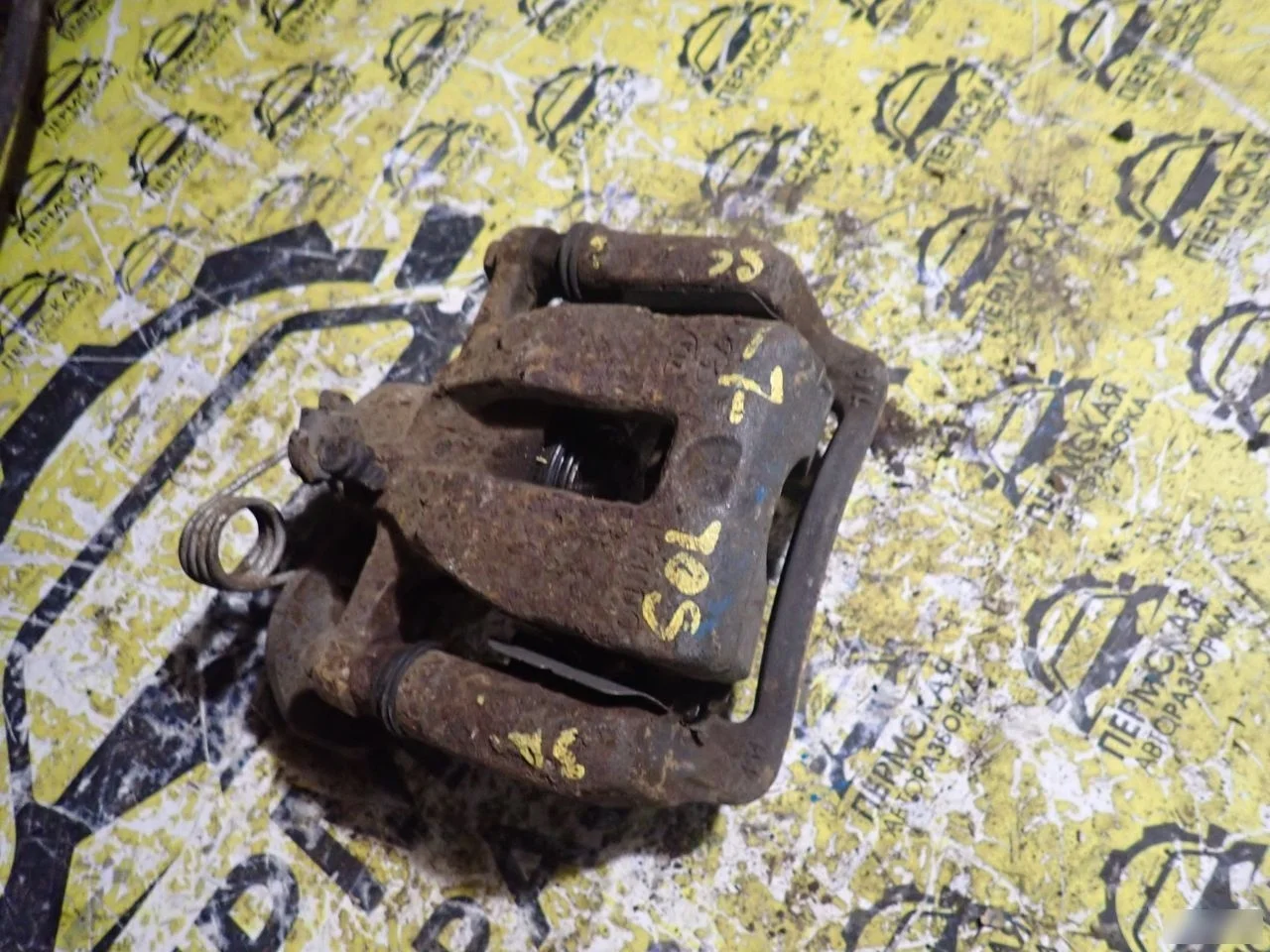 Суппорт тормозной задний левый Hyundai Solaris 1