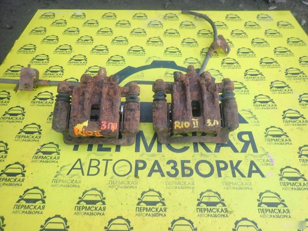 Суппорт задний kia rio 2 2005-2011