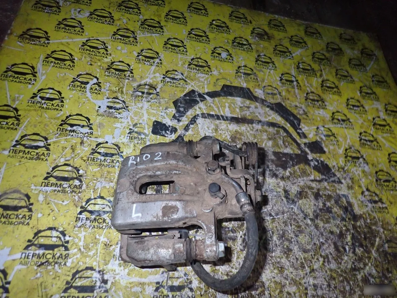 Суппорт тормозной задний левый Kia RIO 2005-2011