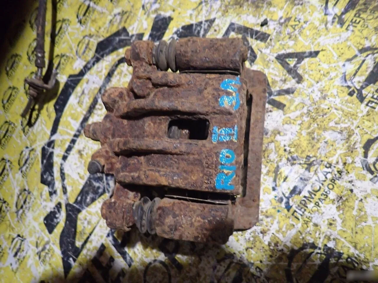 Суппорт тормозной задний левый Kia RIO 2005-2011