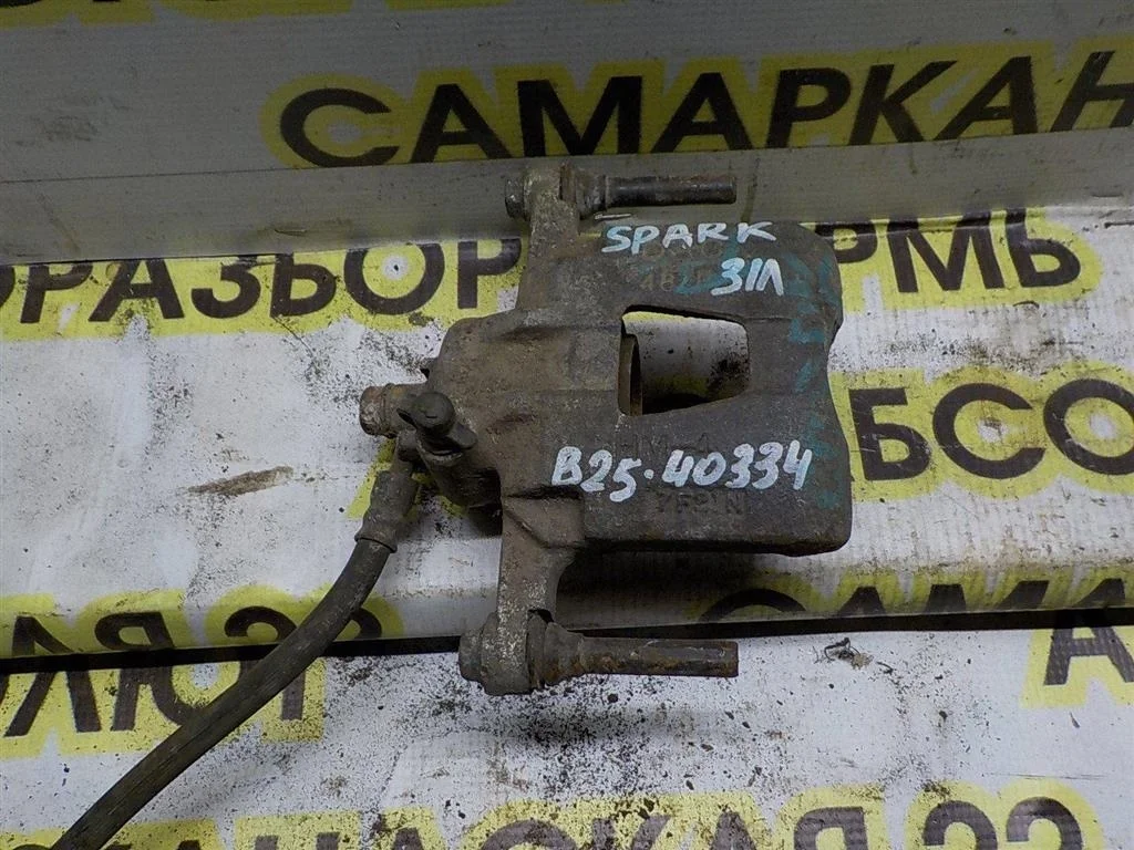 Суппорт передний правый Chevrolet Spark II (M200/M250) 2005-2009