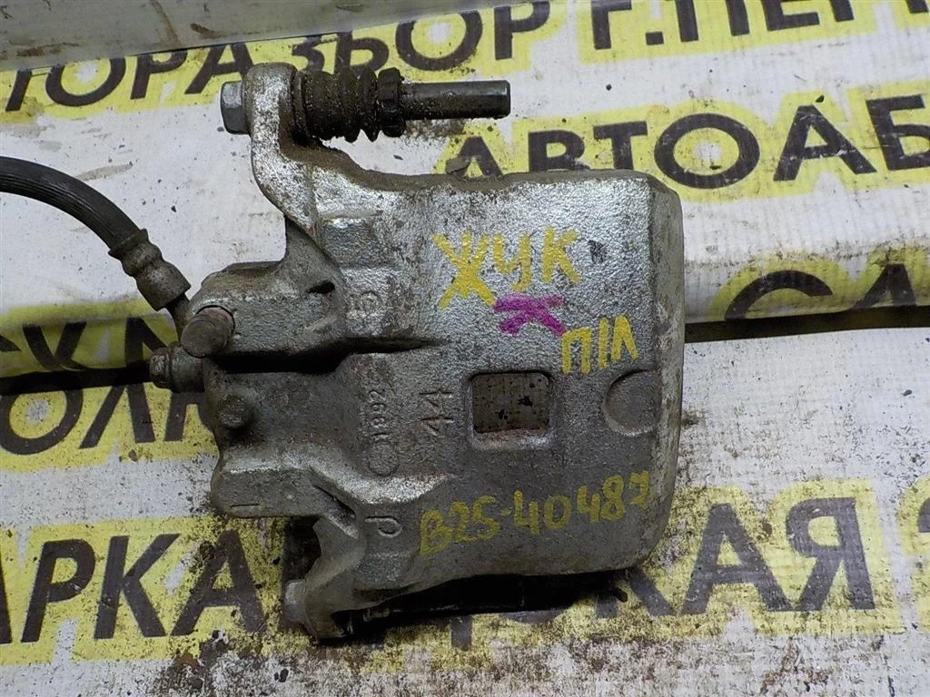 Суппорт передний левый Nissan Juke I (2010—2014)