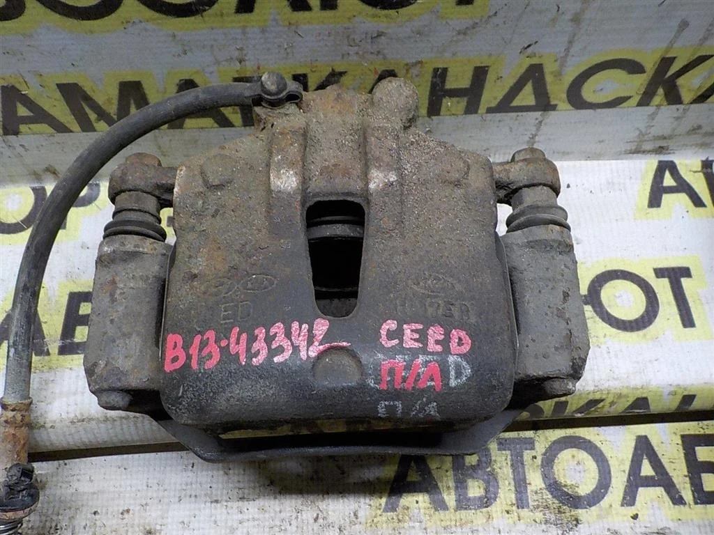 Суппорт передний левый KIA Ceed (ED) 2006- 2012