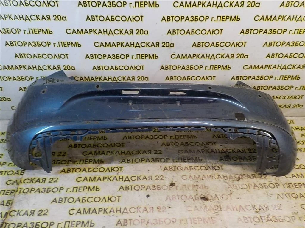 Бампер задний Opel Astra J 2009-2015