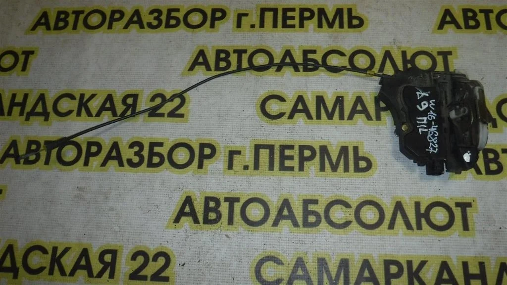 Замок двери передней левой Mitsubishi Lancer 9 (CS) 2003-2006