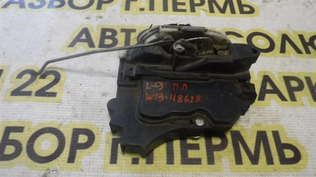 Замок двери передней левой Mitsubishi Lancer 9 (CS) 2003-2006