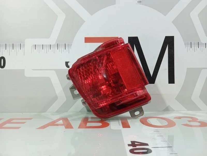 Фонарь бампера заднего левый Toyota Land Cruiser