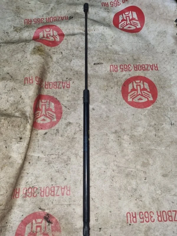 Амортизатор капота Volkswagen Passat 2011 B7