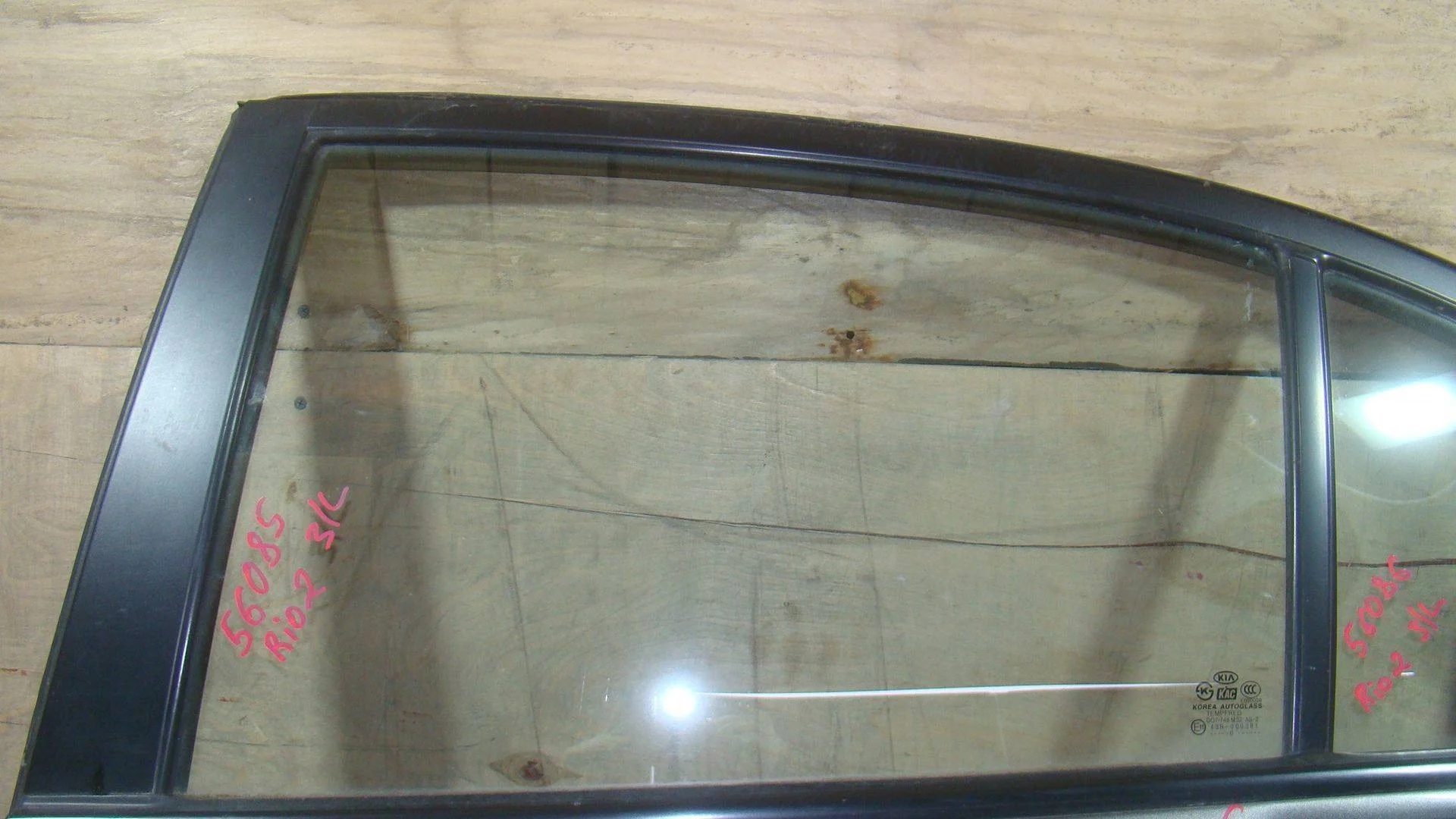 Стекло двери задней левой Kia RIO II (JB) 2005-2011