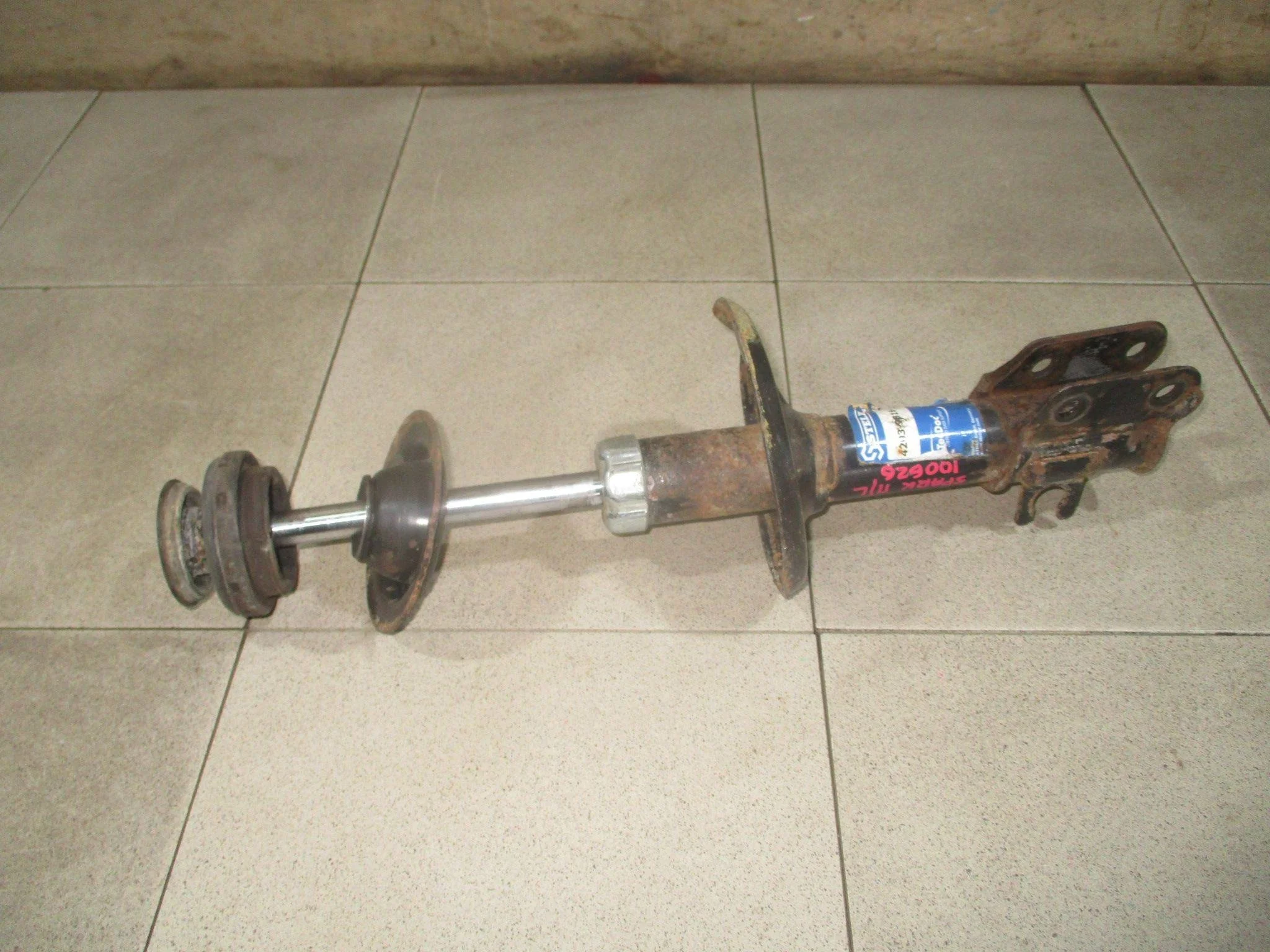 Амортизатор передний левый Chevrolet Spark (M200/M250) 2005-2009