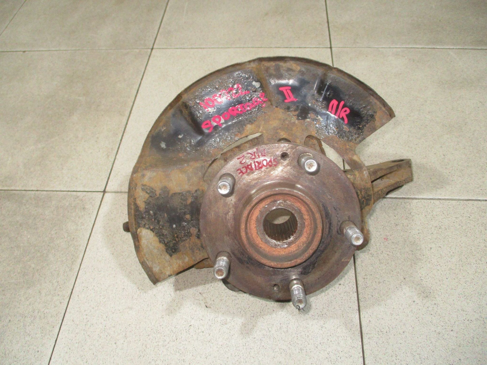 кулак поворотный Kia Sportage II (KM) 2004-2010
