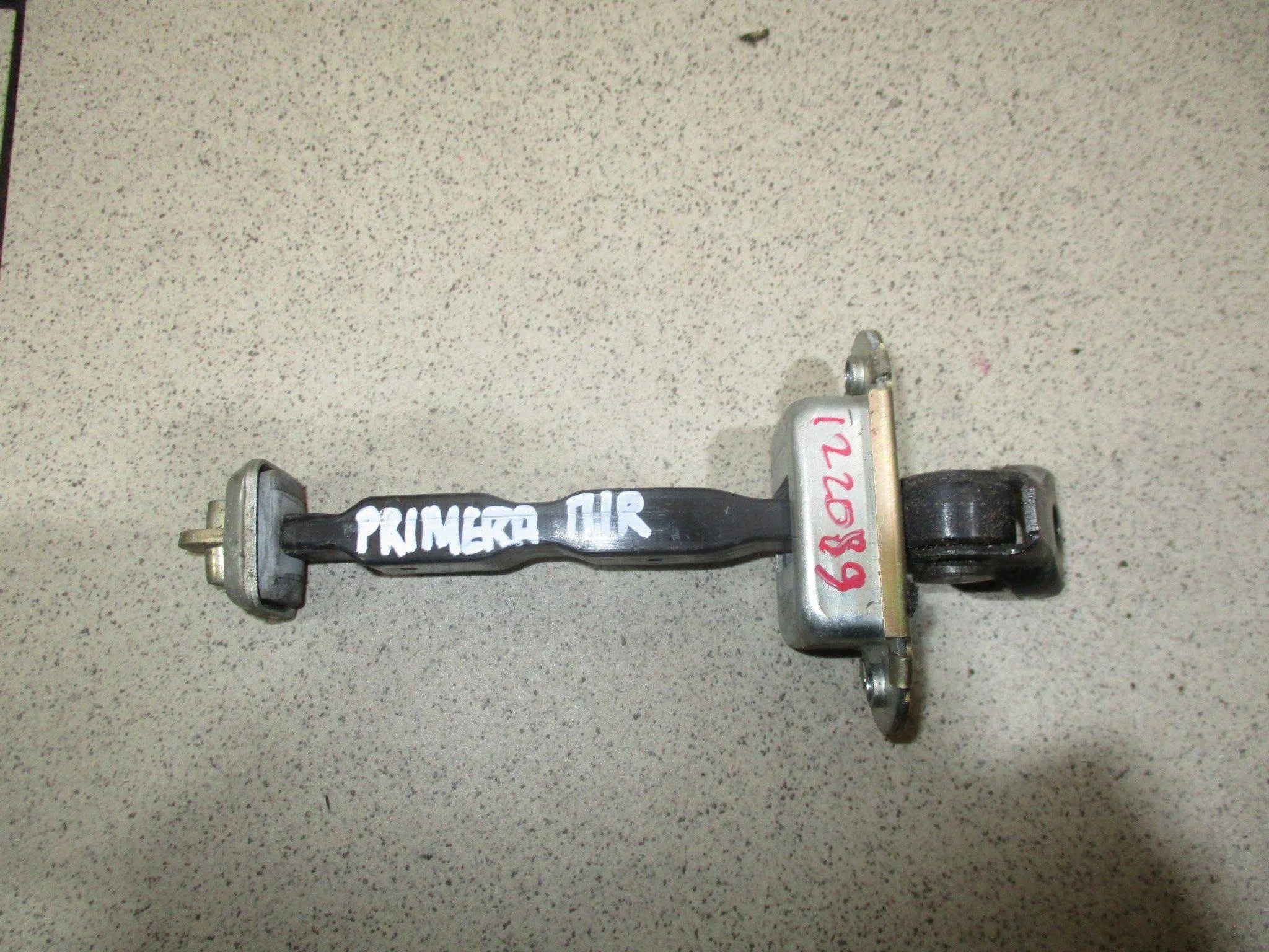 Ограничитель двери Nissan Primera (P12) 2001-2008