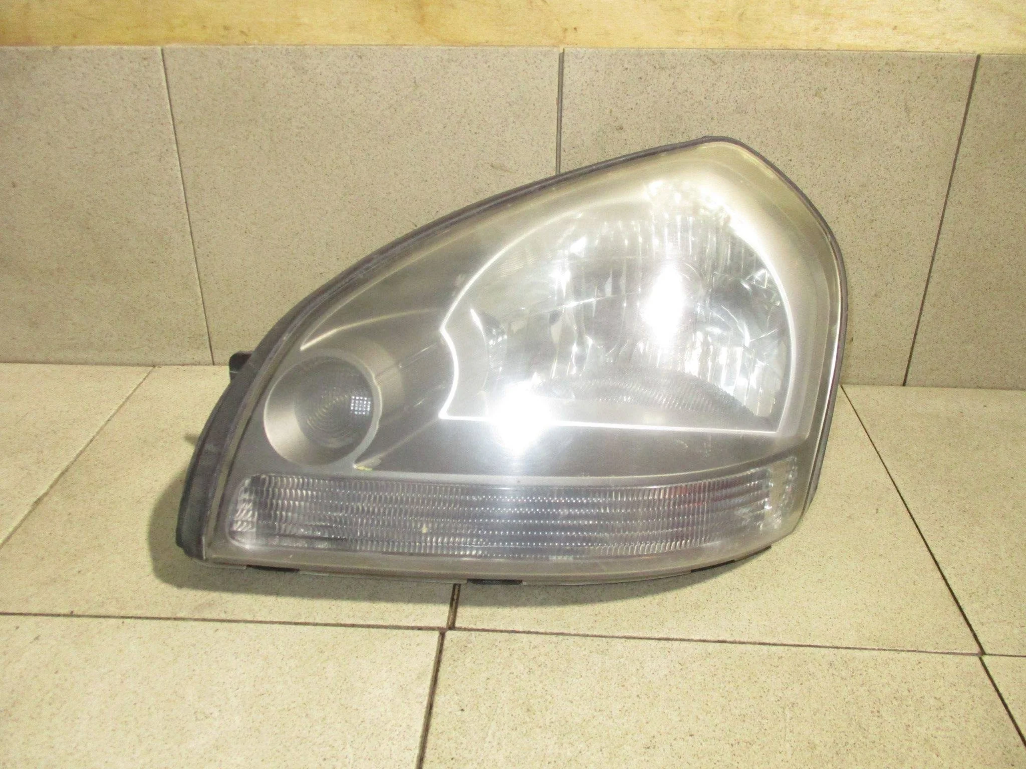 фара Hyundai Tucson (JM) 2004-2009