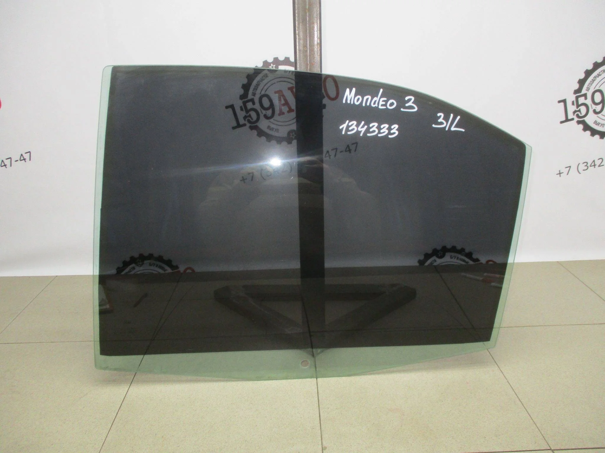 Стекло двери задней левой Ford Mondeo III 2000-2007