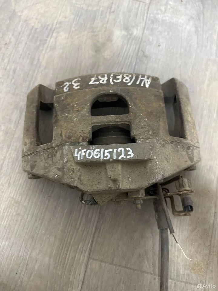 Суппорт тормозной передний левый vag