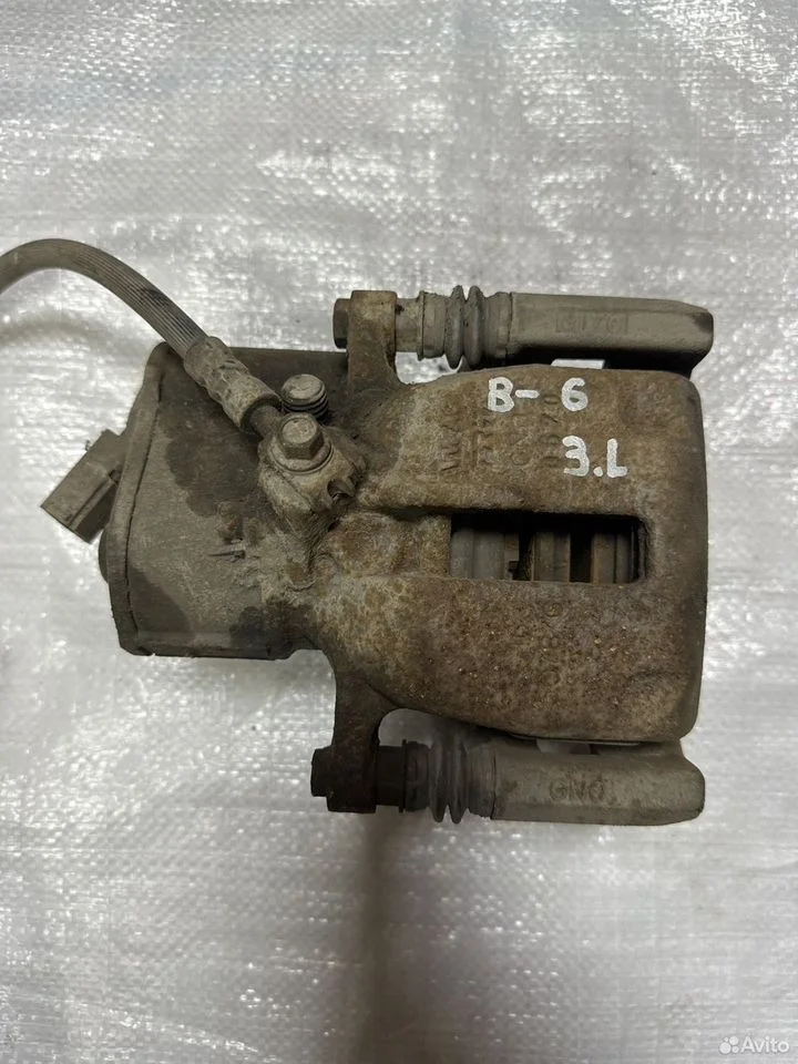 Суппорт задний левый vag