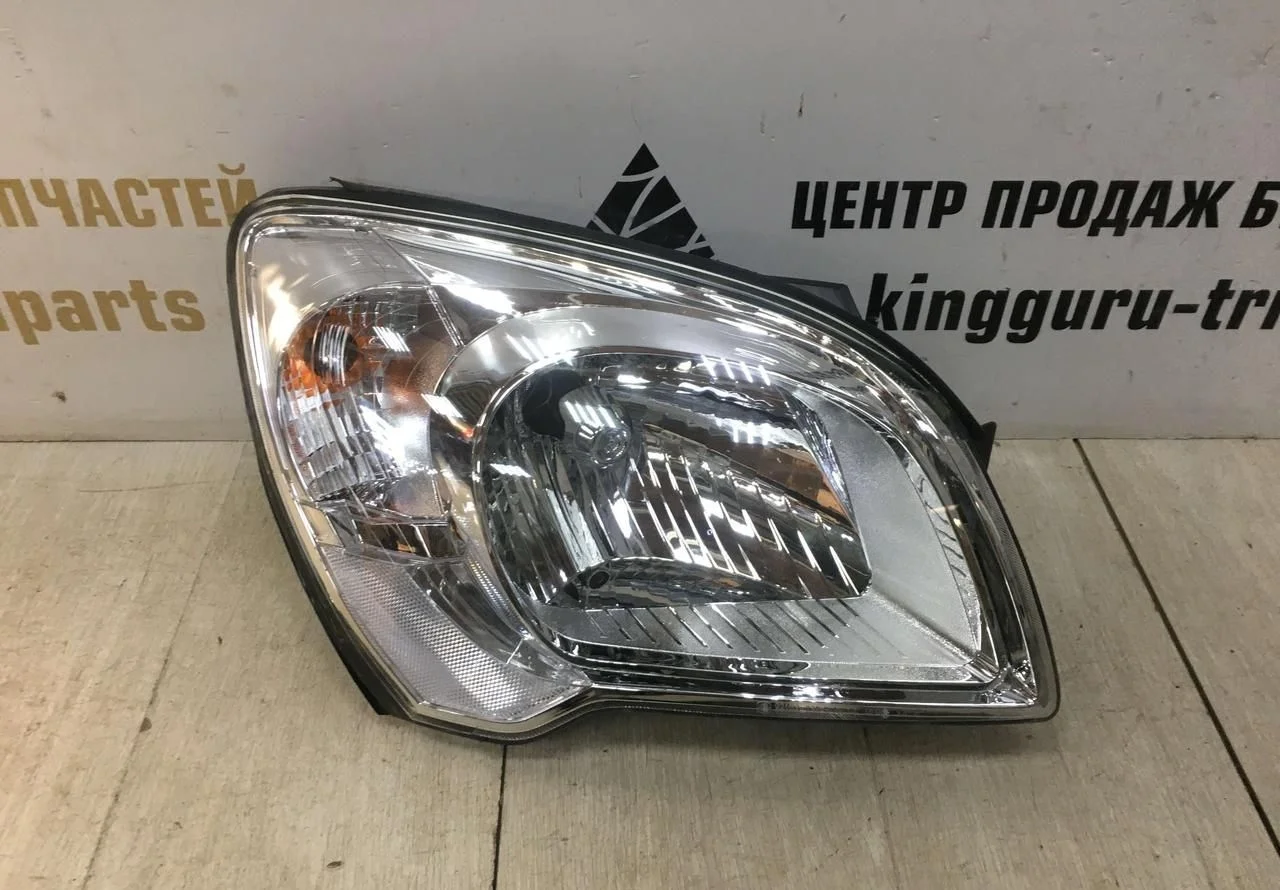 Фара правая Kia Sportage 2 2004-2008 OEM 921021F011