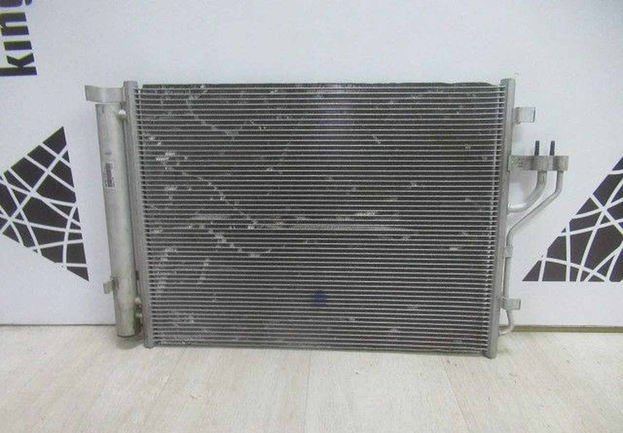 Радиатор кондиционера Kia Sportage 3 / Hyundai ix35 (10>) oem 976062Y501