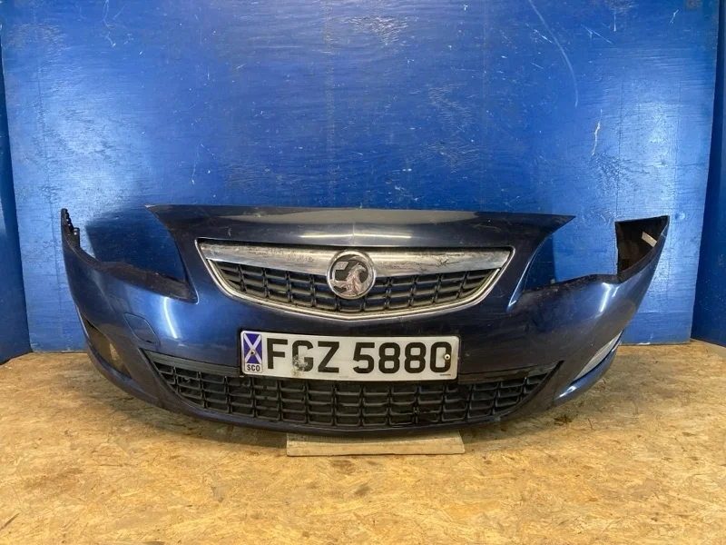 Бампер Opel Astra J 2009-2012 13264403, передний
