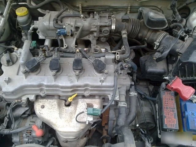 Двигатель Nissan Primera 10102AU0SB QG16DE