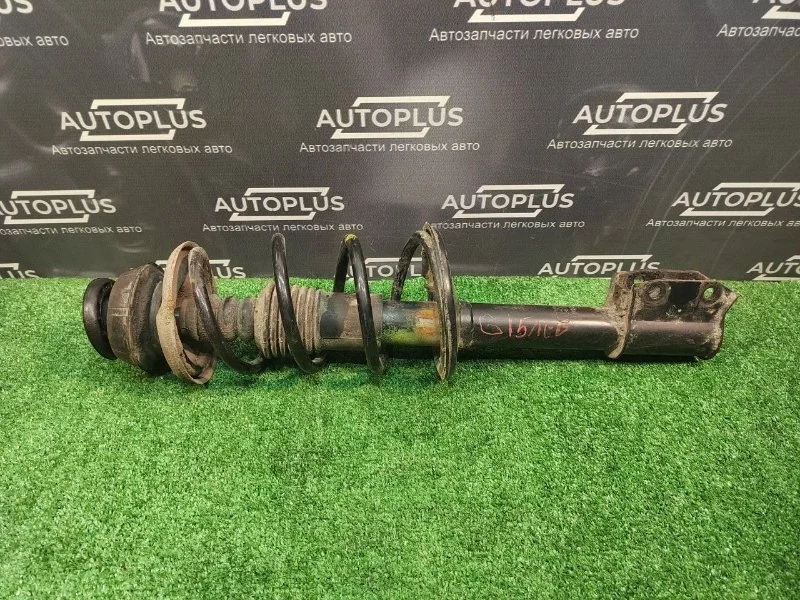 Стойка Nissan Almera 2016 5611000Q0A G15 K4M 848, передняя левая