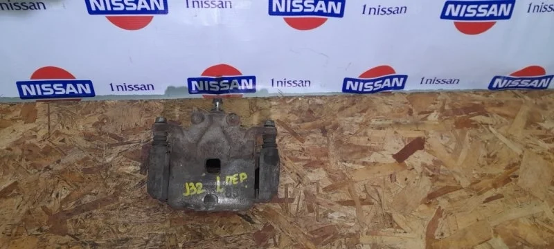 Суппорт тормозной Nissan Teana 2008-2013 41011JN00A J32 VQ 25, передний левый