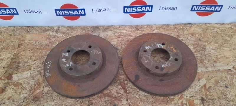 Диск тормозной Nissan Primera 1996-1999 402062F501 P11 GA16DE, передний