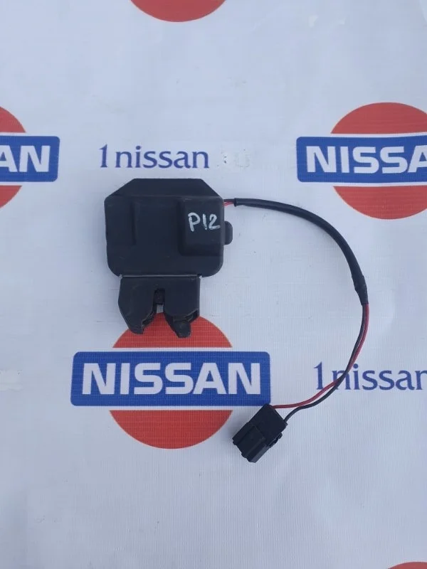 Замок багажника Nissan Primera 2002-2006 84630AV600 P12 QG16-QG18, задний