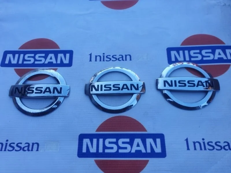 Эмблема Nissan Almera 2012-н.в. 84890EW000 G15 K4M, задняя