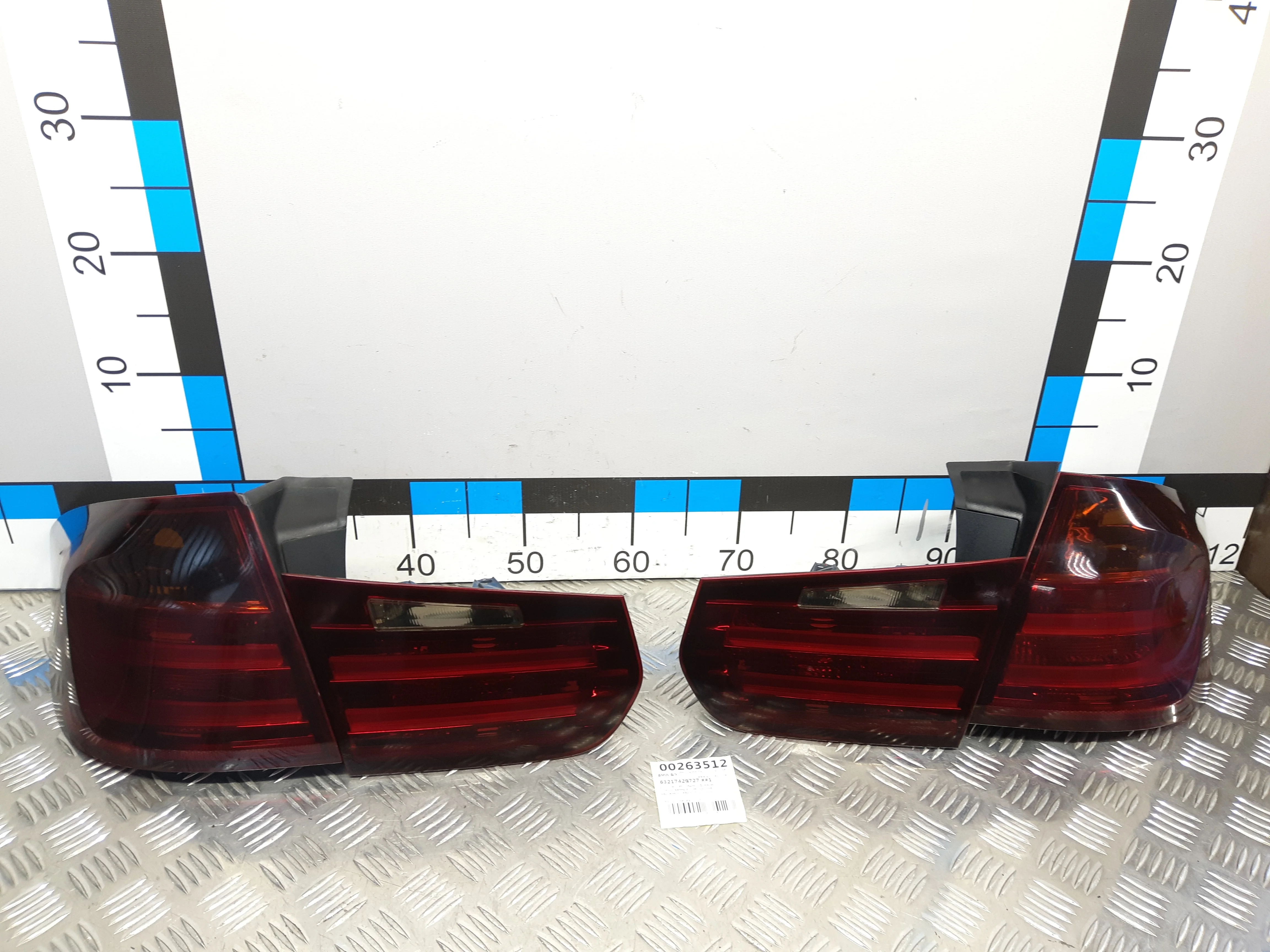 [Б/У] Комплект задних фонарей BMW 3-Серия F31 - тонированные / не оригинал / наружный левый 63217429727 [Код: 00346309 ]