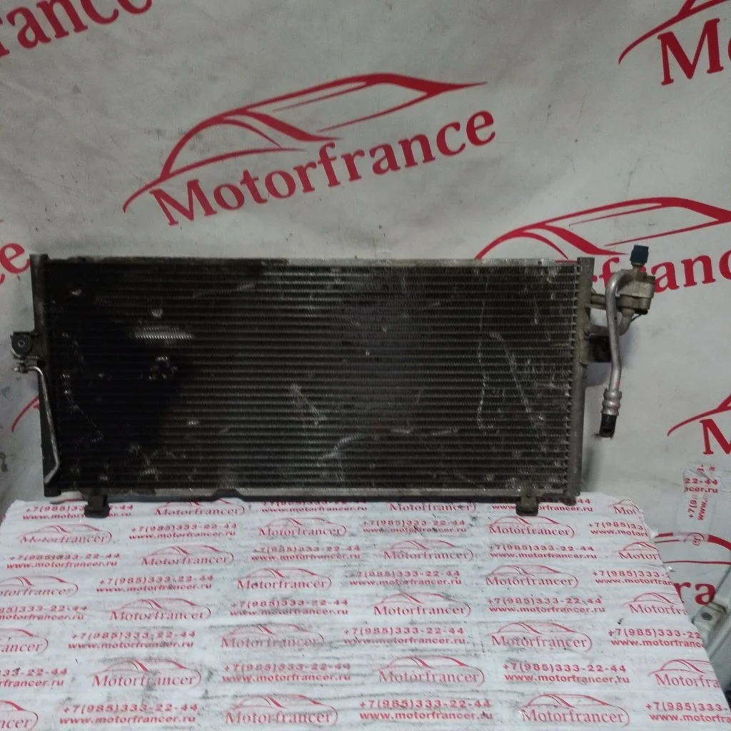Радиатор кондиционера (конденсер) Nissan Primera 2001 921109F515 P11