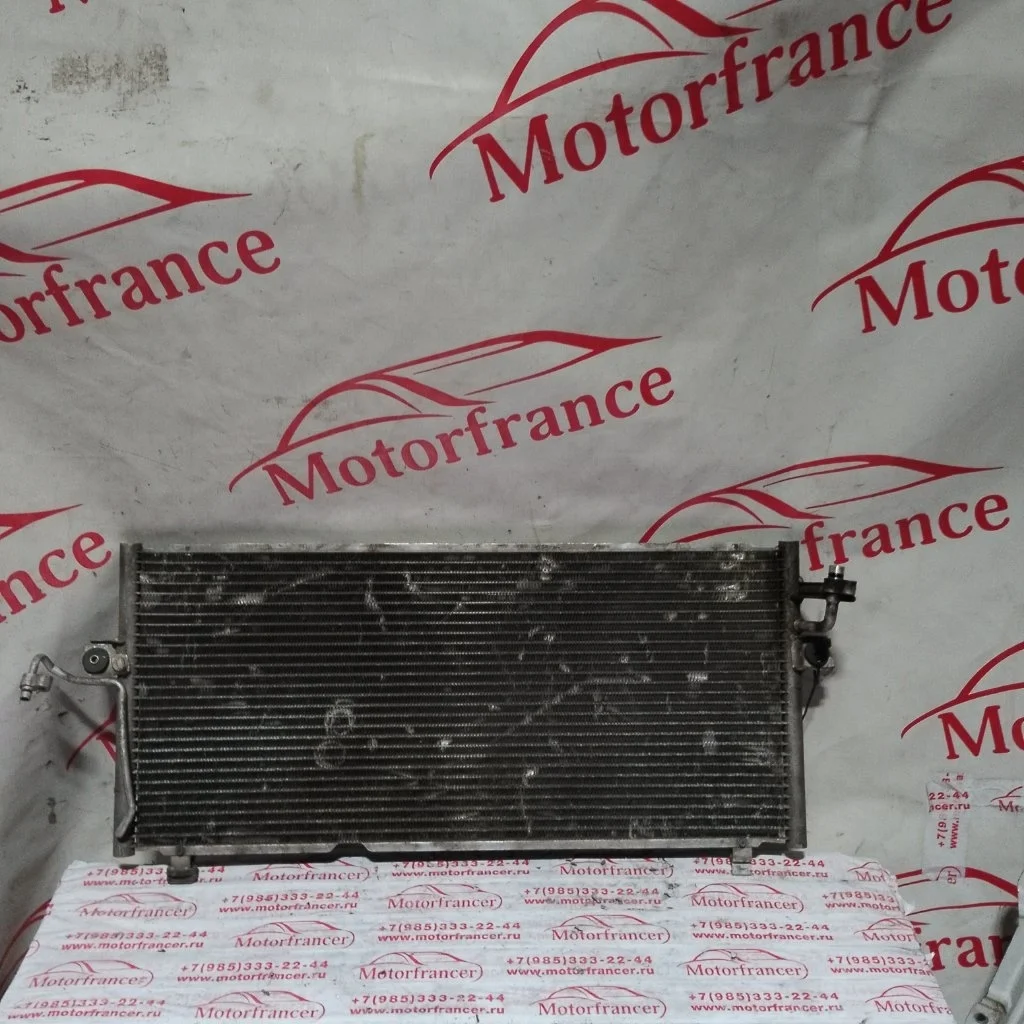 Радиатор кондиционера (конденсер) Nissan Primera 2001 921109F515 P11