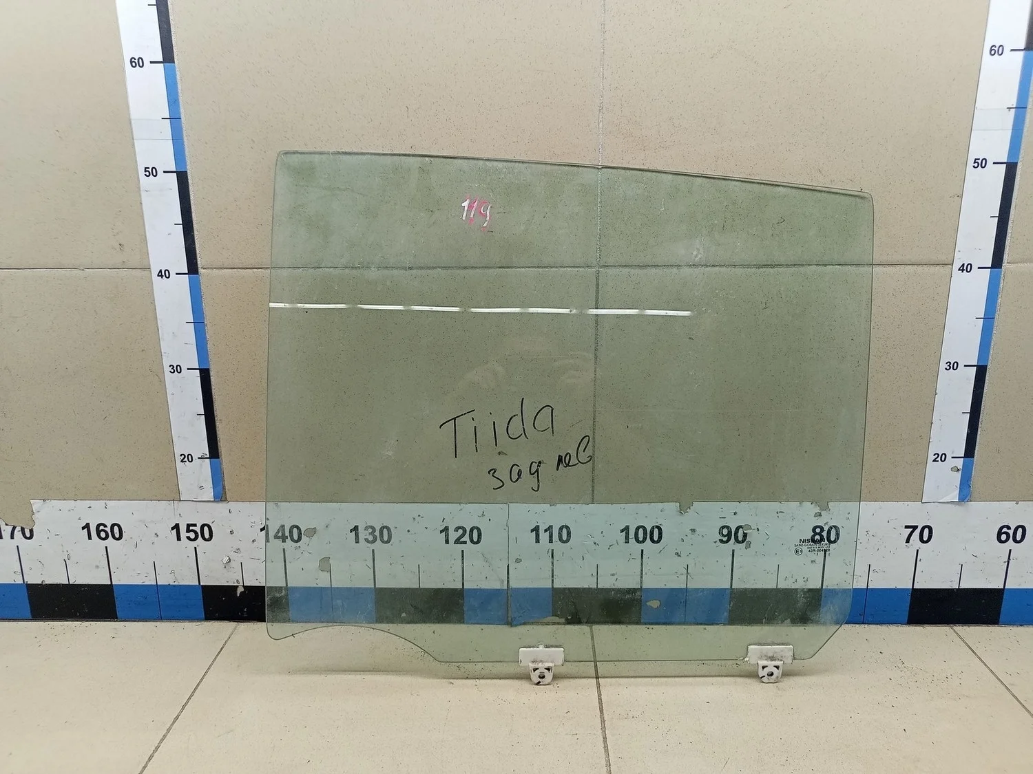 Стекло двери задней левой Tiida (C11) 2007-2014