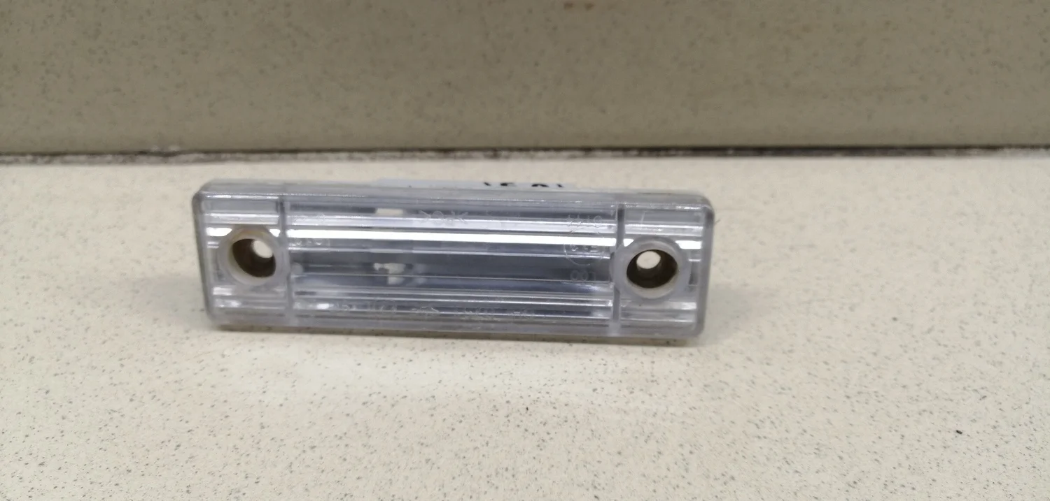 Фонарь подсветки номера Aveo (T200) 2003-2008